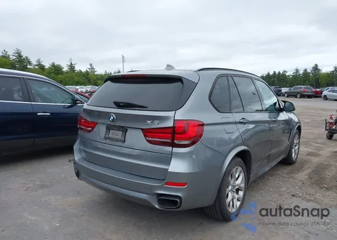 2014 BMW X5 xDrive50I z USA, uszkodzony, nr VIN 5UXKR6C54E0C02423